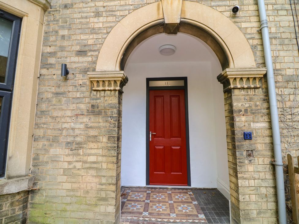 An entrance with red door and patterned tiles at 2 in Peterborough