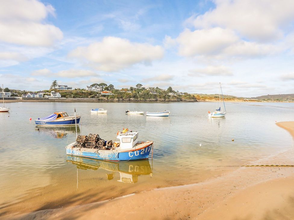 A view of boats at a beach near houses at Cilan - 2 Ty'n Don Llanengan near Abersoch