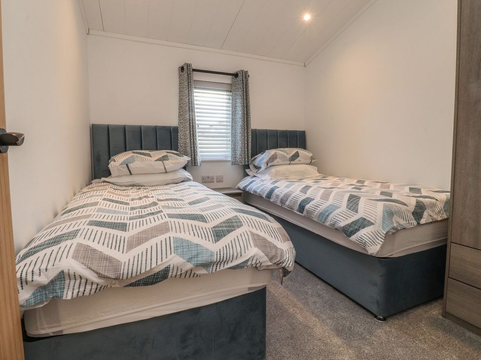 A bedroom with two beds and a window at Number 35 in 