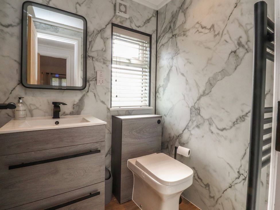 A bathroom with a sink and toilet at Number 35