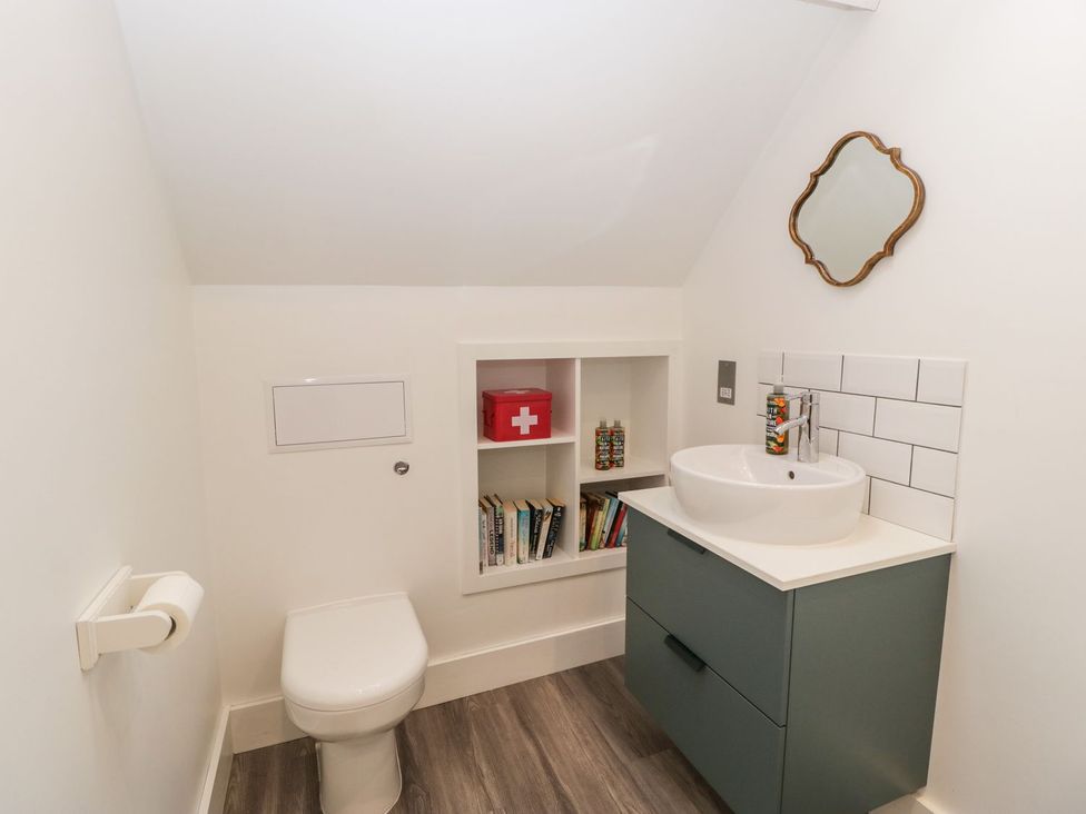 A bathroom with a sink and toilet at The End in Langport