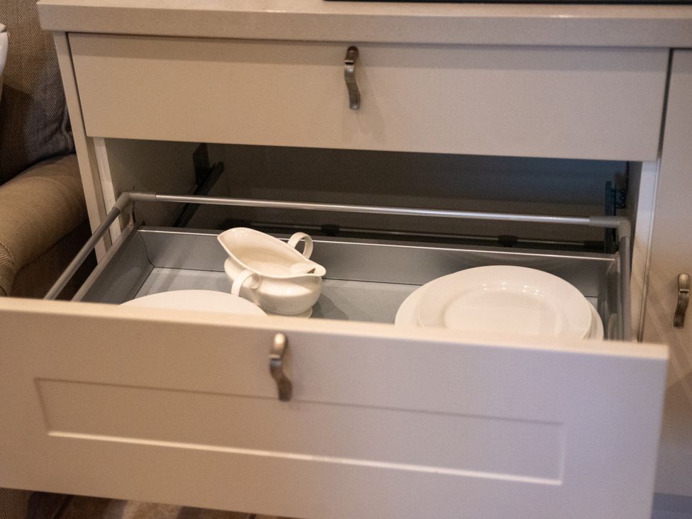 A kitchen drawer with plates and a sauceboat at The End in Low Ham near Langport