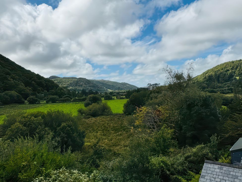 A landscape view with mountains and fields at The Old Post Office null