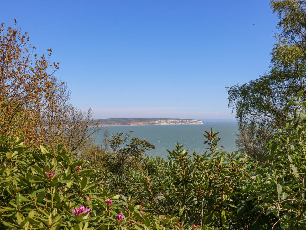 A view of cliffs and sea under a blue sky at 6 Priory in Shanklin