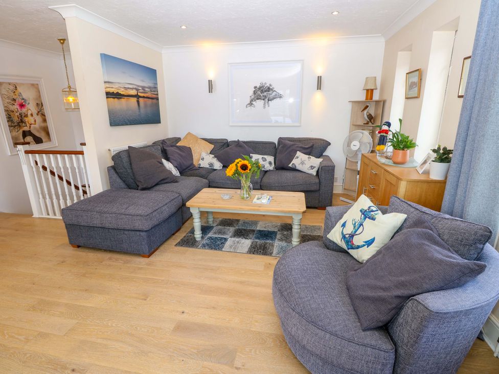 A living room with a sofa and coffee table at Riverview in Hamble