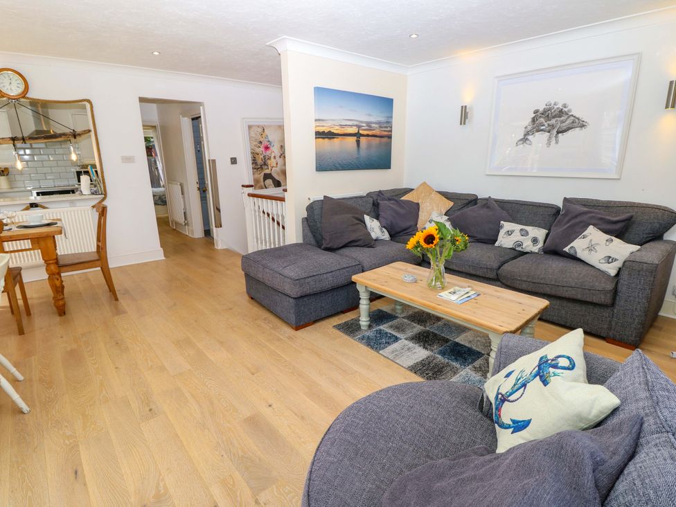A living room with a sofa and coffee table at Riverview in Hamble