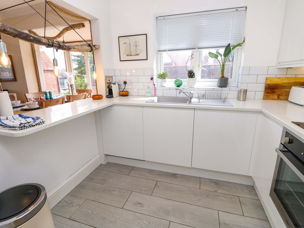 A kitchen with a sink and countertop at Riverview in Hamble