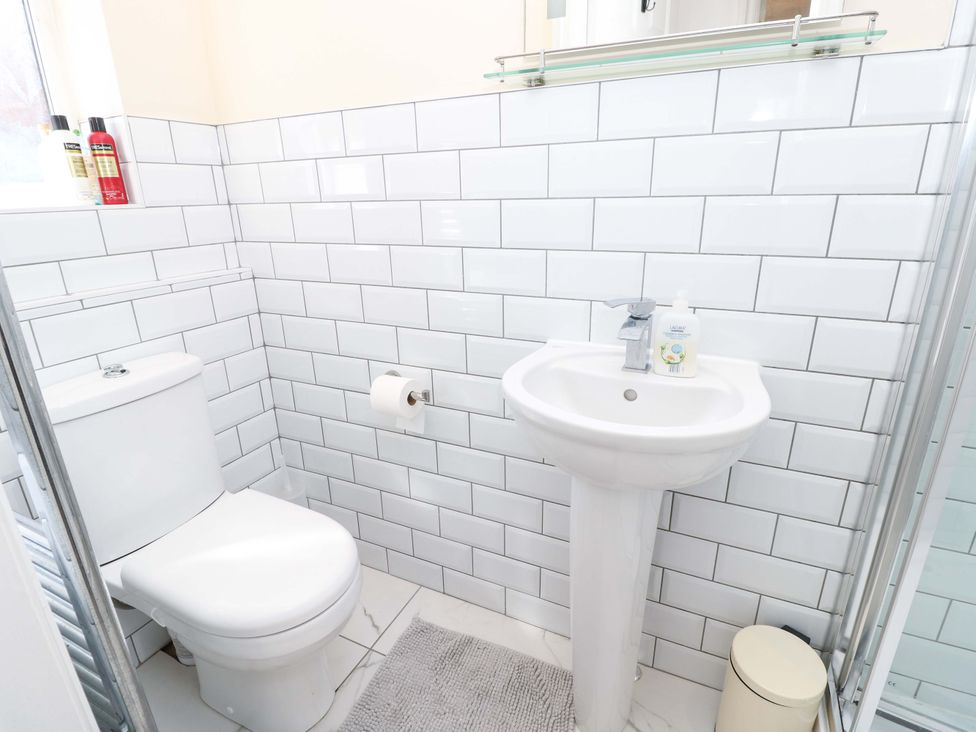 A bathroom with a toilet and sink at Riverview in Hamble