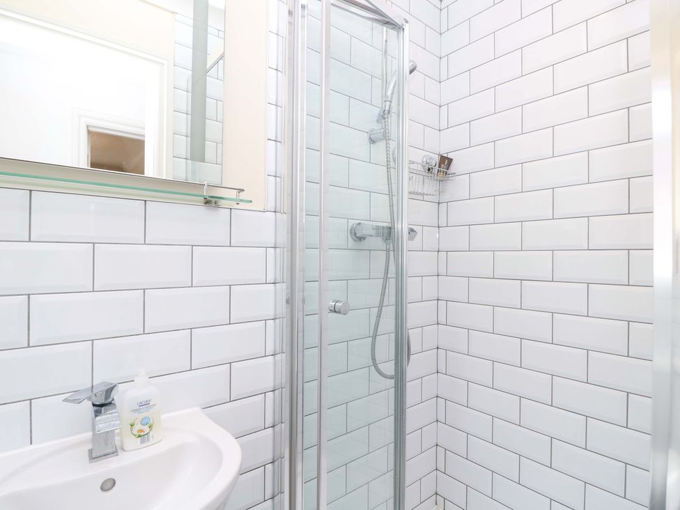 A bathroom with a shower and sink at Riverview in Hamble
