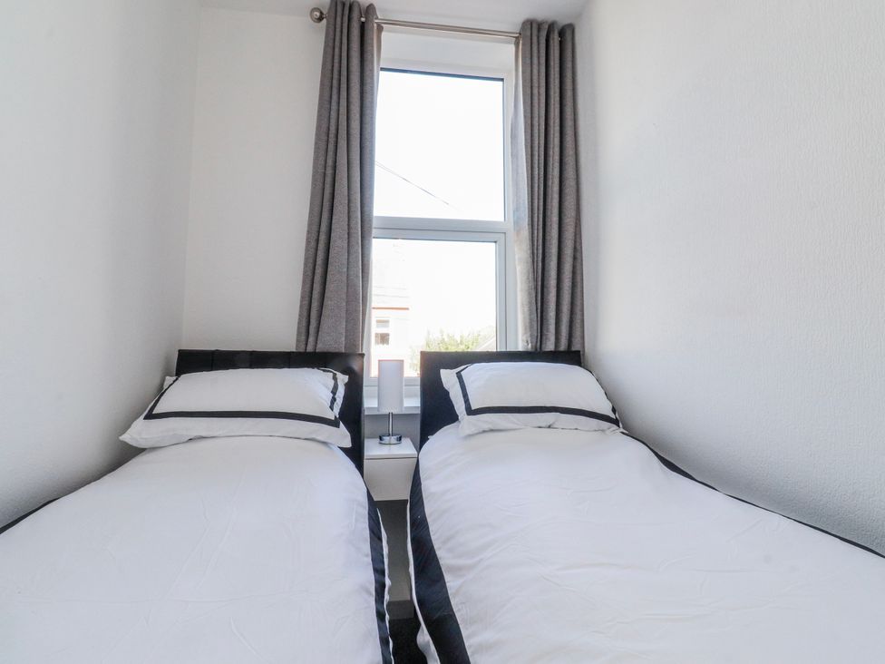 A bedroom with two single beds at Bliss in Lytham St. Annes