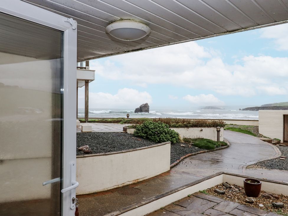 An outdoor view of the sea with a rock formation at 8 Thurlestone Rock in Kingsbridge