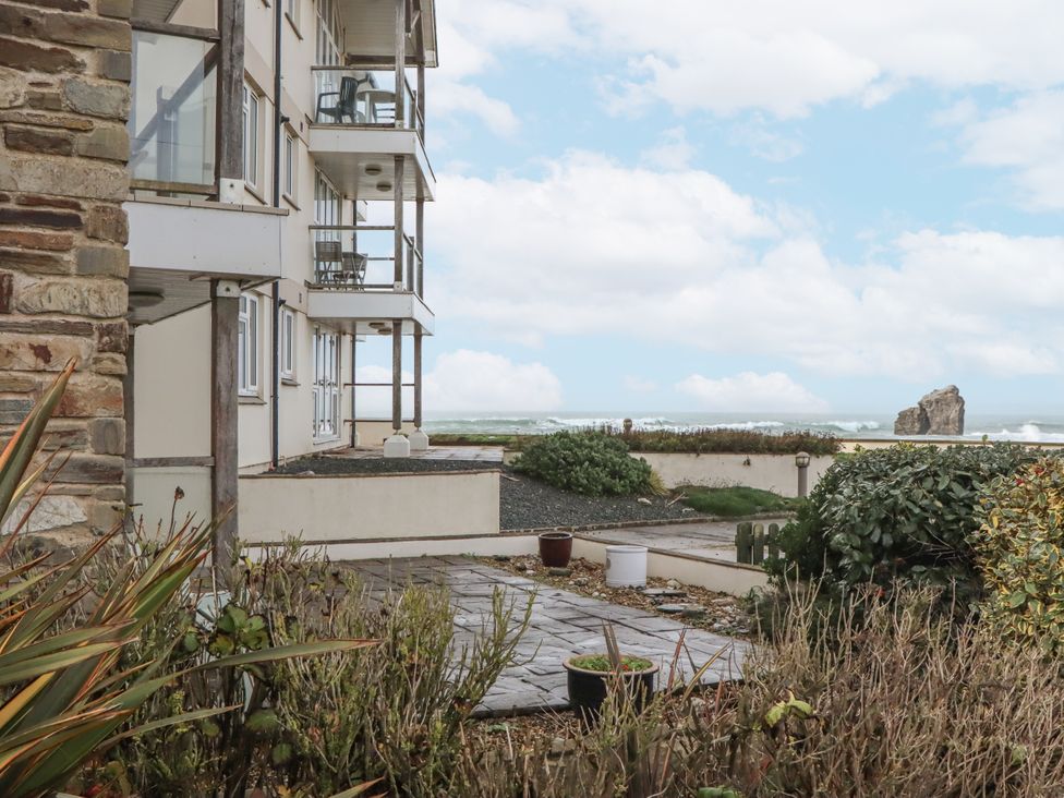 An outdoor area with a building, balcony, and ocean view at 8 Thurlestone Rock in Kingsbridge