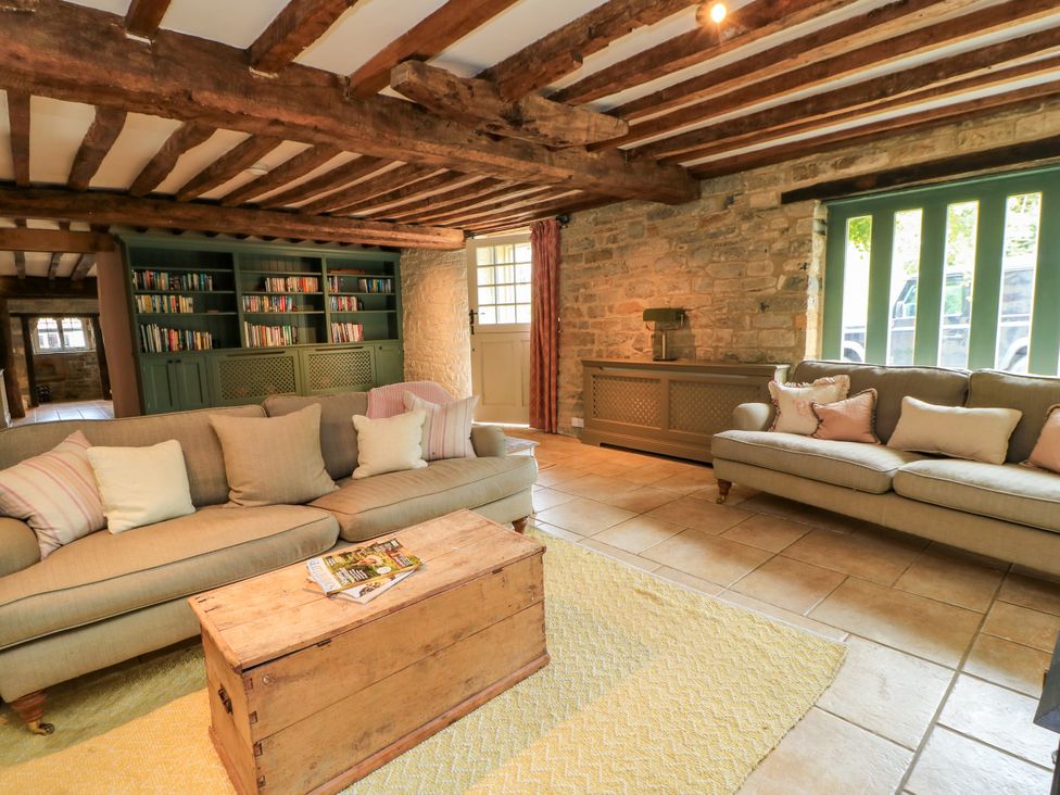 A living room with a sofa and coffee table at The Farmhouse in Langport