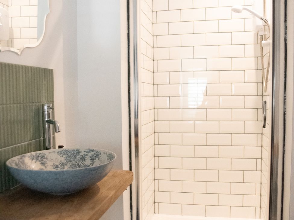 A bathroom with shower and sink at The Farmhouse in Langport