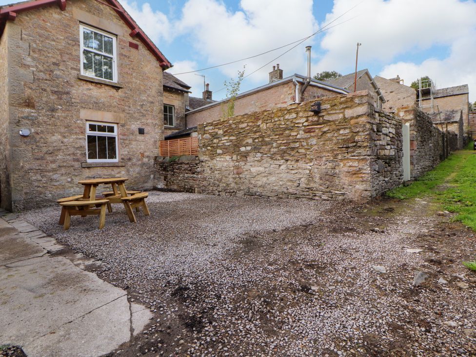 An outdoor area with a table and chairs at East View in Ravenstonedale near Kirkby Stephen
