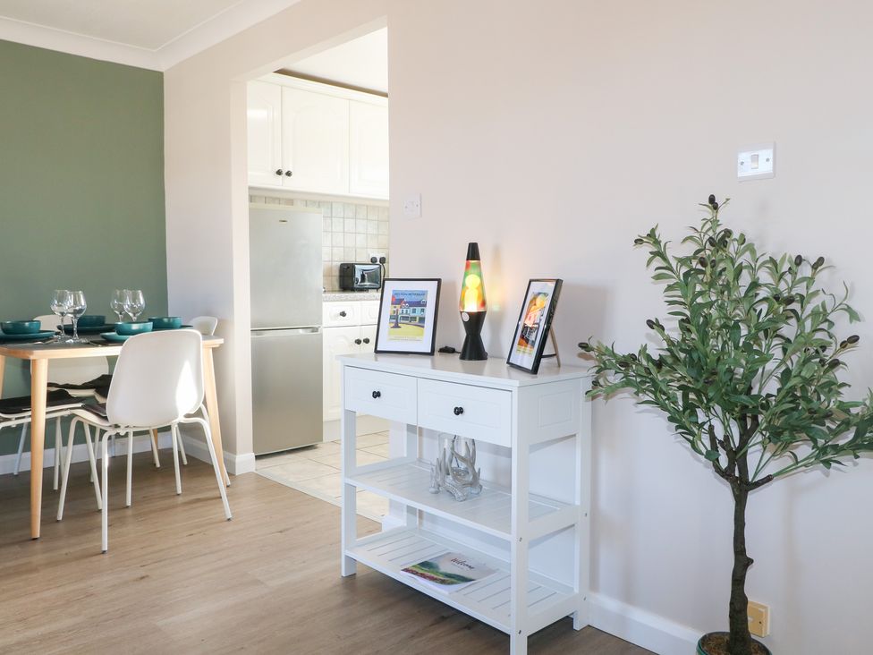 A dining room with a table and chairs at The Cuckoo's Rest in Melton Mowbray