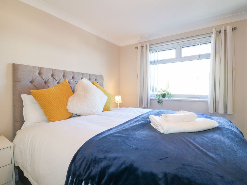 A bedroom with a bed and pillow at The Cuckoo's Rest in Melton Mowbray