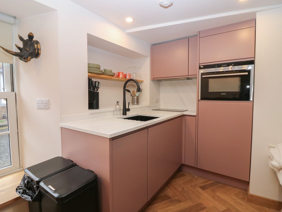 A kitchen with sink and oven at 2 East Port, Melrose