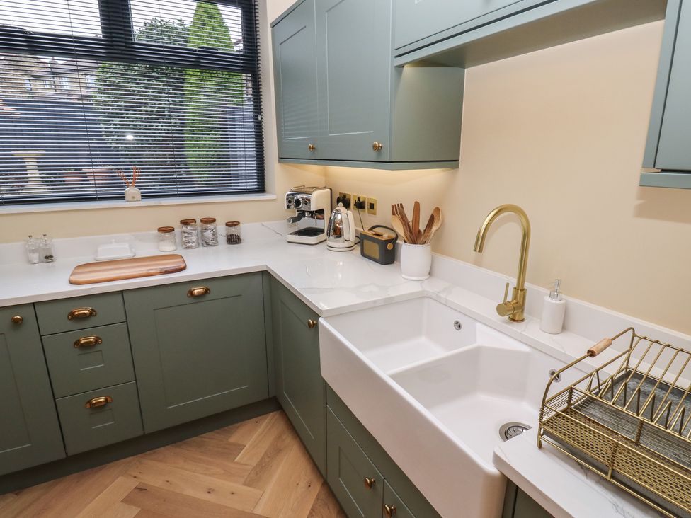 A kitchen featuring a sink and countertop at Fairfield House in Almondbury