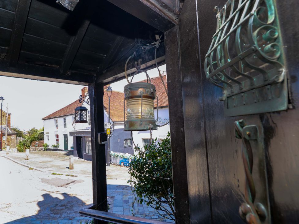 A lantern and door view on the street at The Old House in Hamble