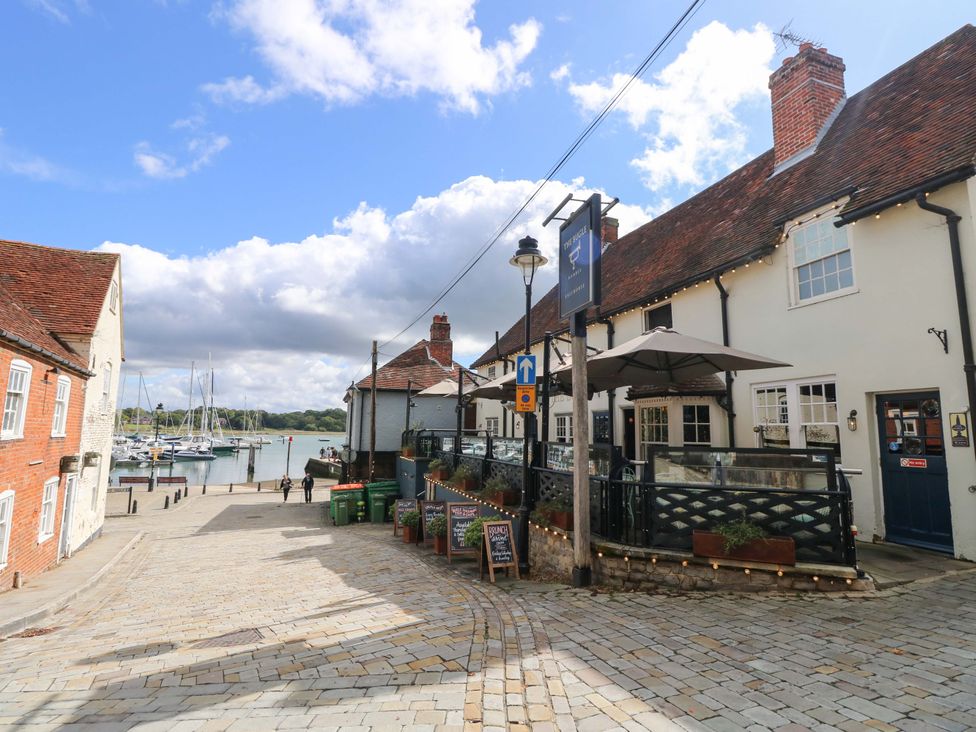A street with buildings and boats at The Old House in Hamble
