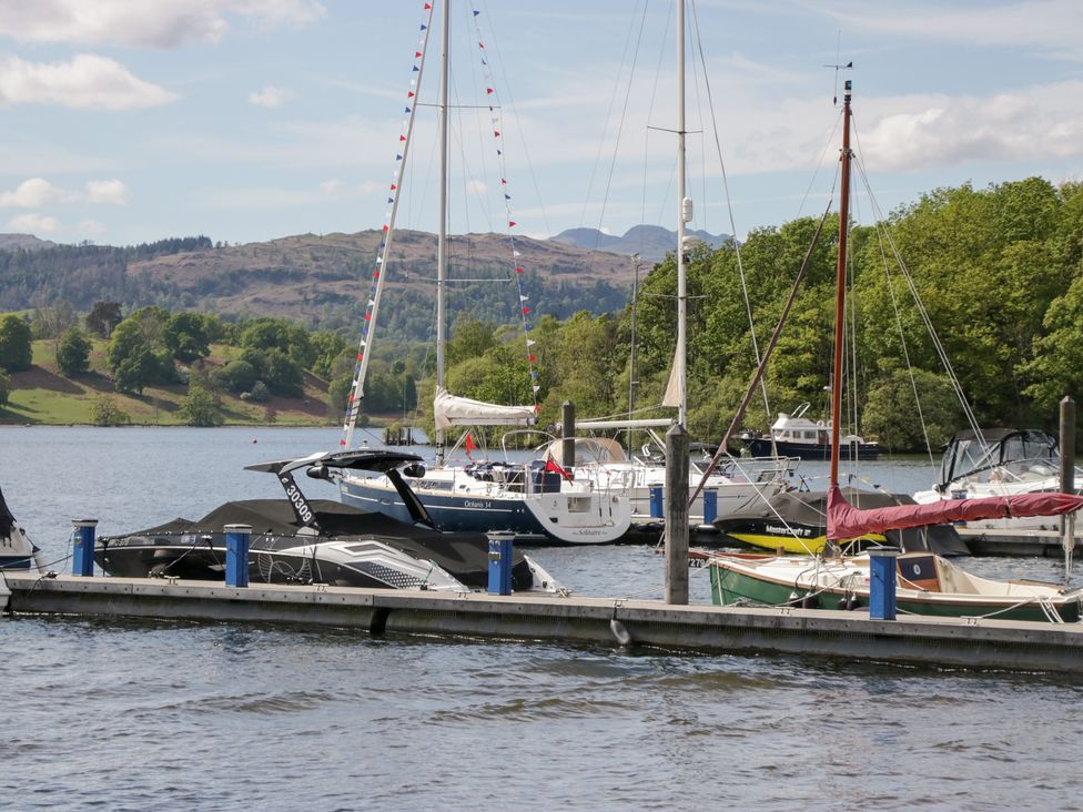 A marina with boats moored at Feather Hill Lodge in Windermere