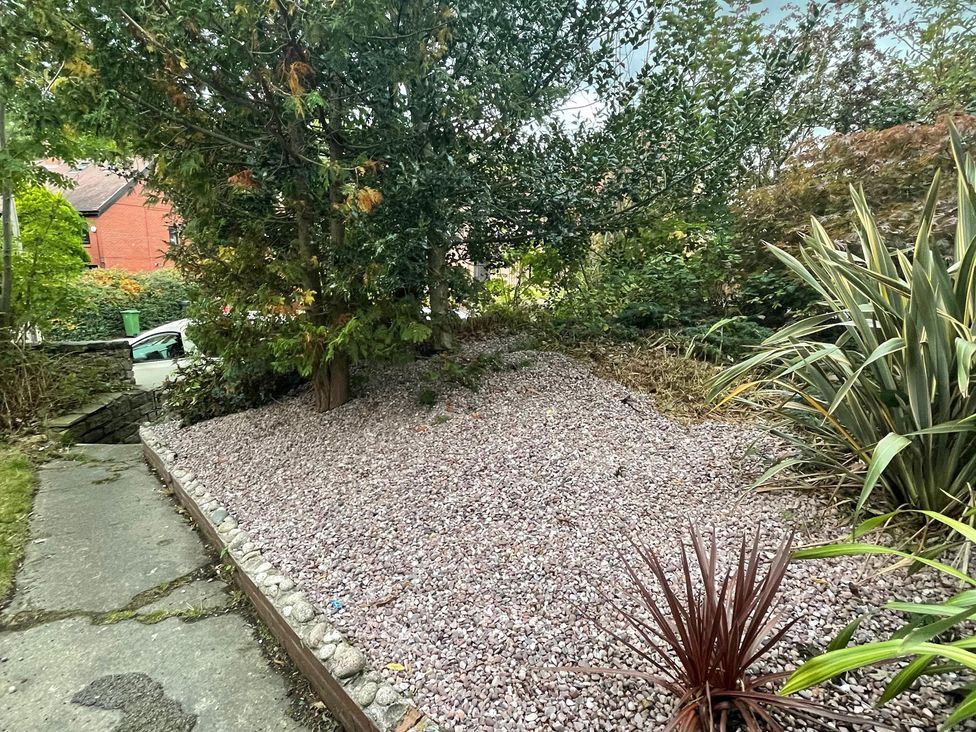 A garden area with gravel and plants at 15A Currier Lane Ashton-under-Lyne