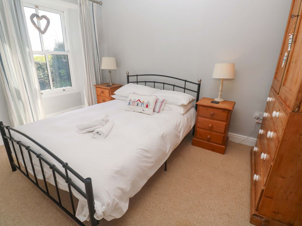 A bedroom with a bed and bedside table at Pedn Brose near Mousehole