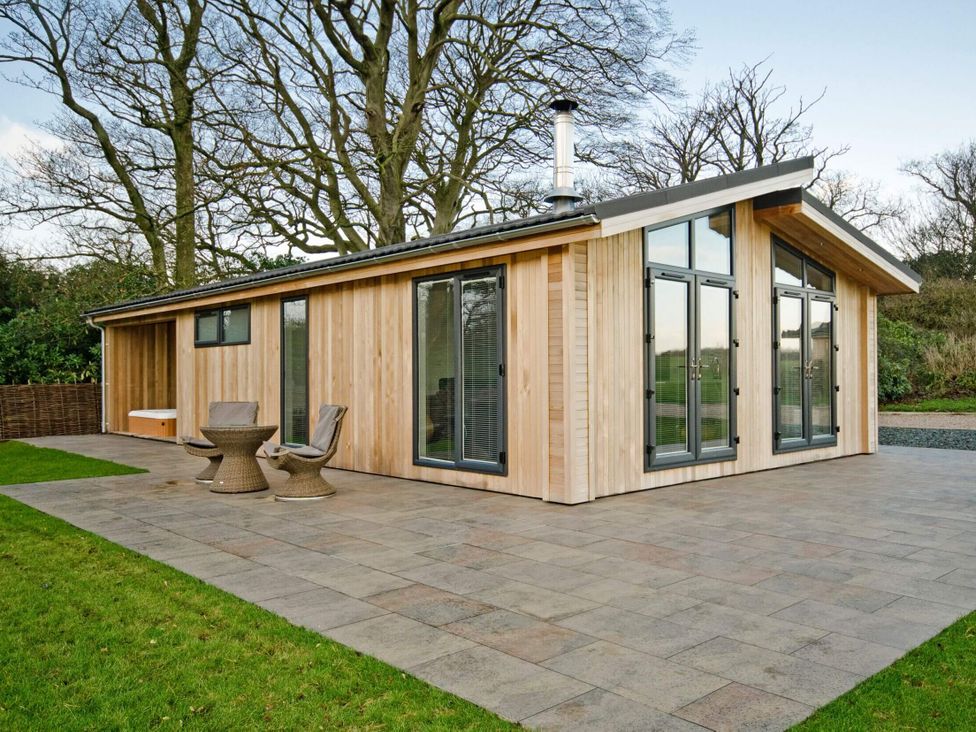 A house with patio furniture at Brayton in Aspatria