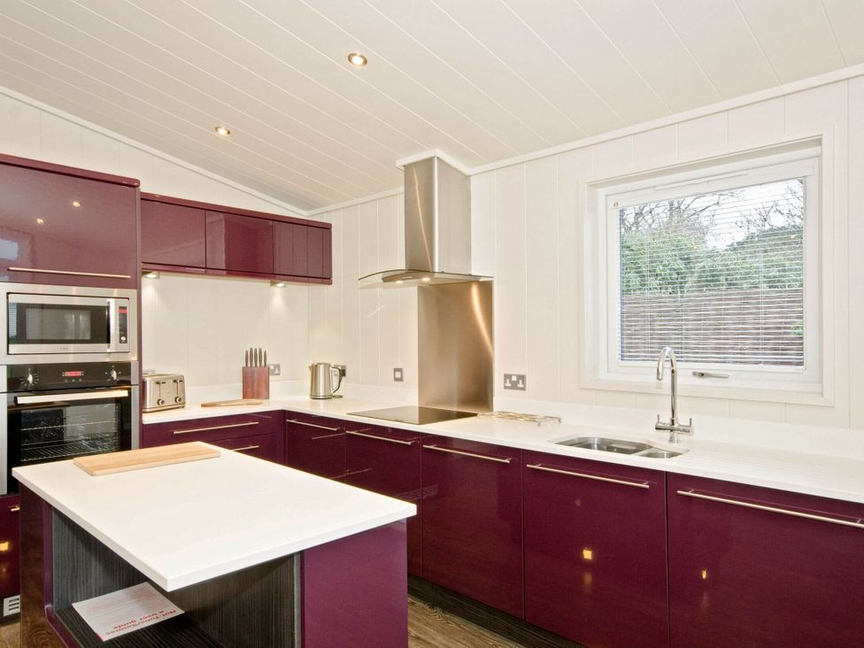 A kitchen with countertop and appliances at Brayton in Aspatria