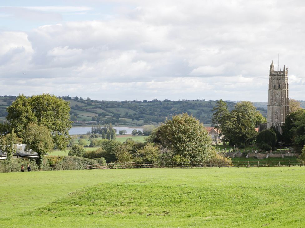 A view of a church and countryside landscape at Redwood Cottage in Bristol