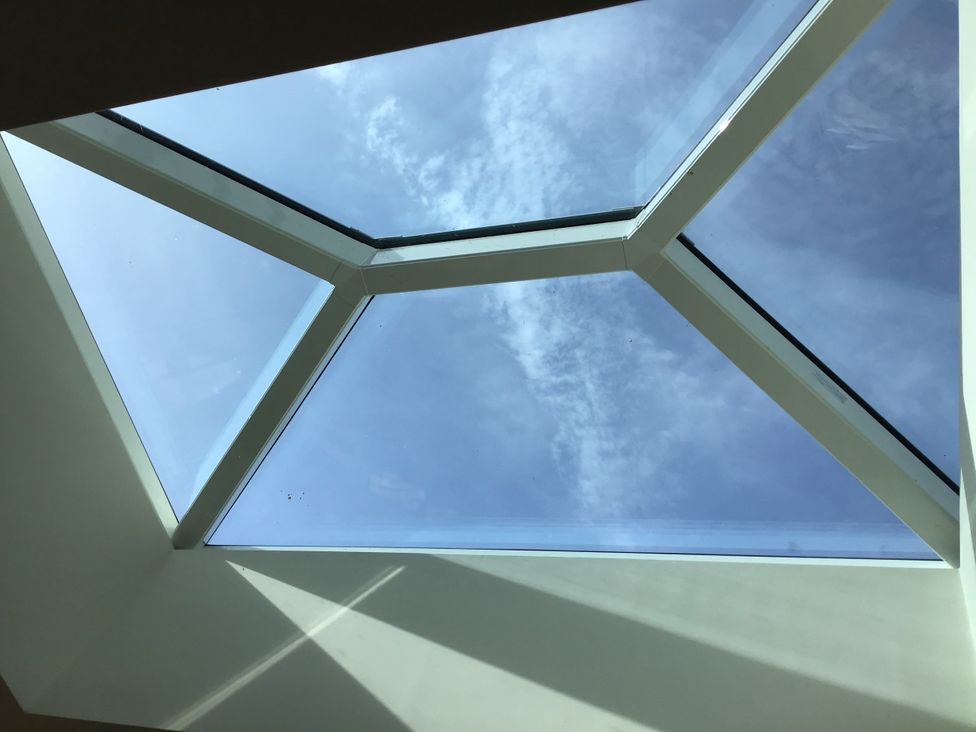 A skylight with clouds visible at Sea Folly in Porthcawl