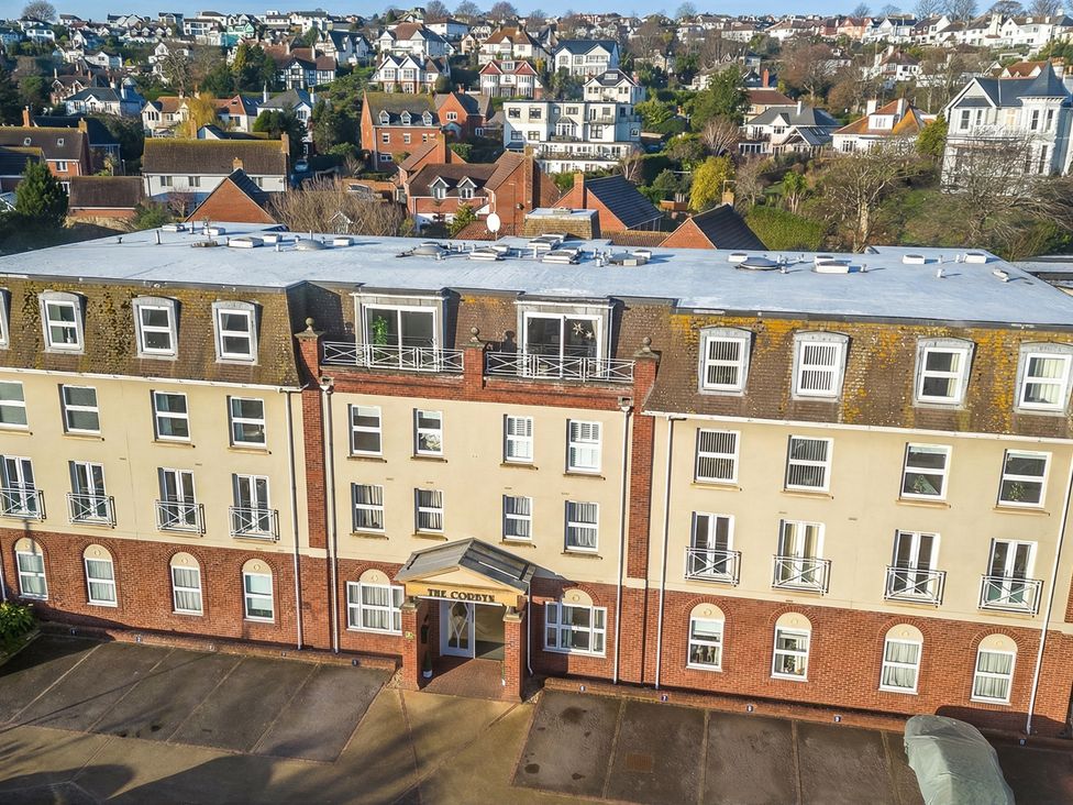 An exterior view of a building with balconies at The Degas Sea View Suite in Torquay