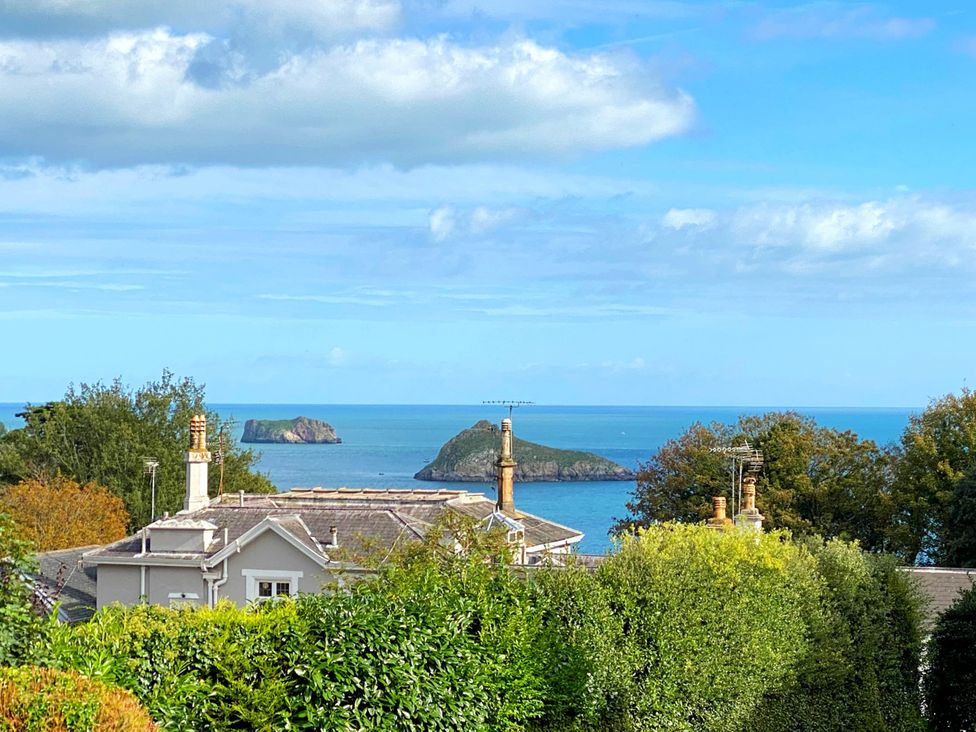 A view including houses, sea, and islands at Lower Stable - The Stables Apartments at Meadfoot Bay, Torquay
