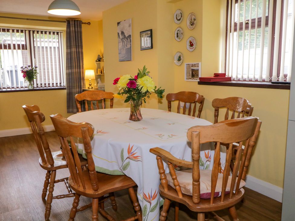 A dining room with a table and chairs at 4 Bed Property in Northern Ireland Garrison, County Fermanagh