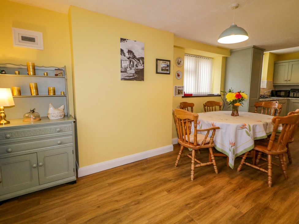 A dining room with a table and chairs at 4 Bed Property in Northern Ireland Garrison, County Fermanagh