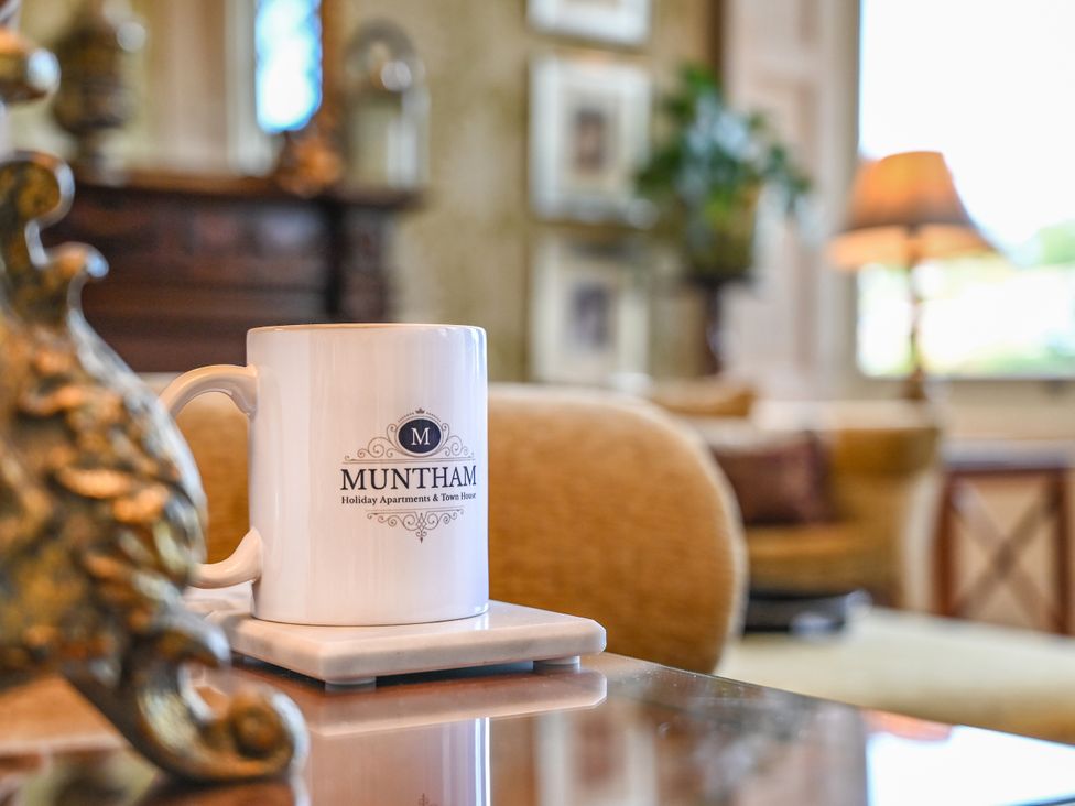 A mug on a table at Muntham Deluxe Apartment 3 in Torquay