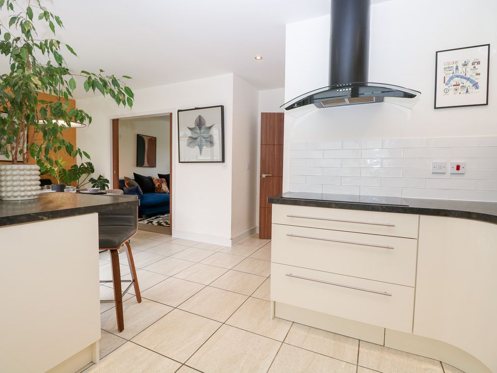 A kitchen featuring a countertop and an exhaust hood at Manor Park View in Norwich
