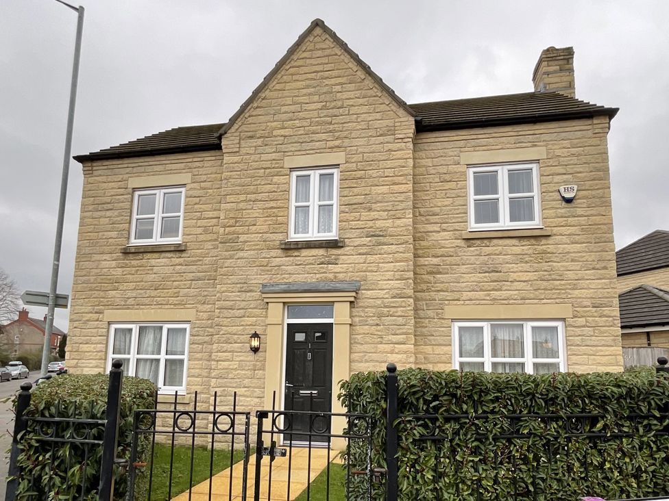 A house with windows and a door at The Winster in Marple, Stockport