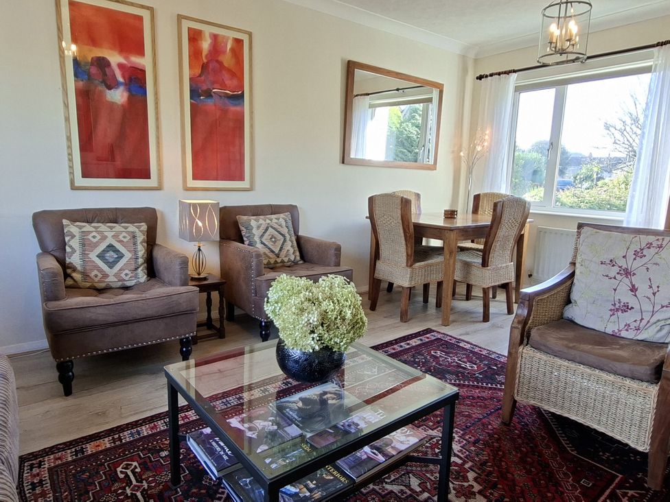 A living room with a sofa and coffee table at Apple Byrd in Kendal