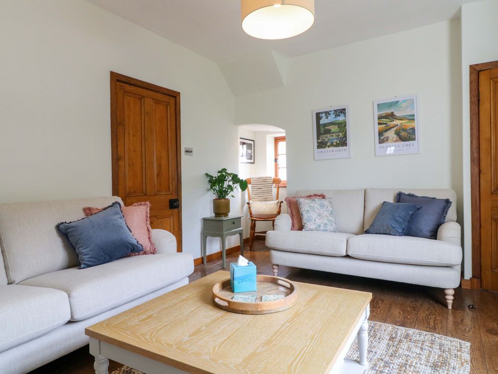 A living room with two sofas and a coffee table at 9 New Lumford