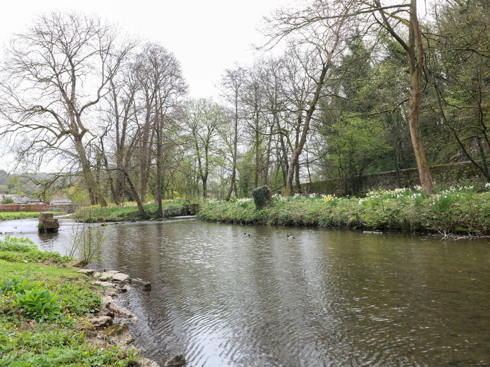 A river with trees and grass alongside at 9 New Lumford