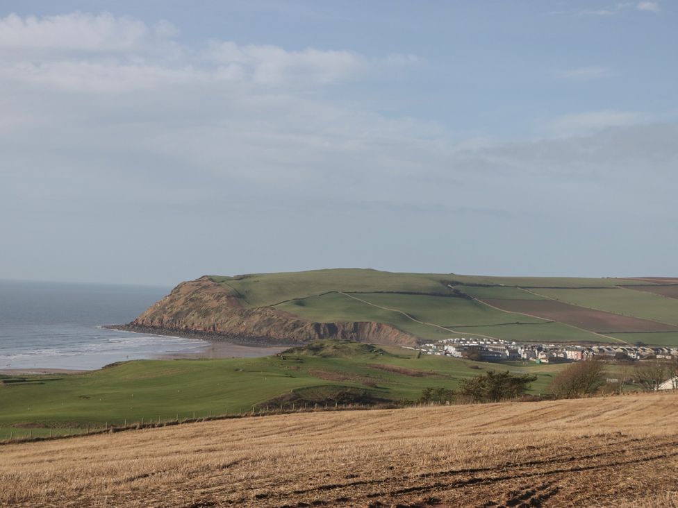 A coastal view with cliffs and fields at Mobility Friendly Caravan St Bees