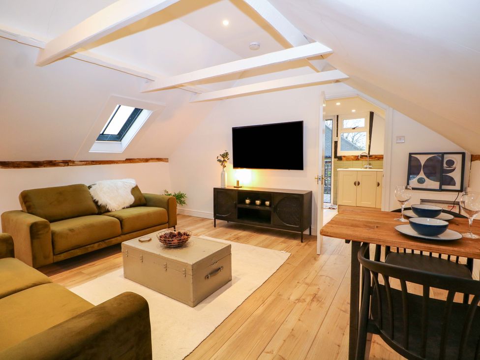 A living room with a coffee table and sofa at Annex in North Chailey near Newick