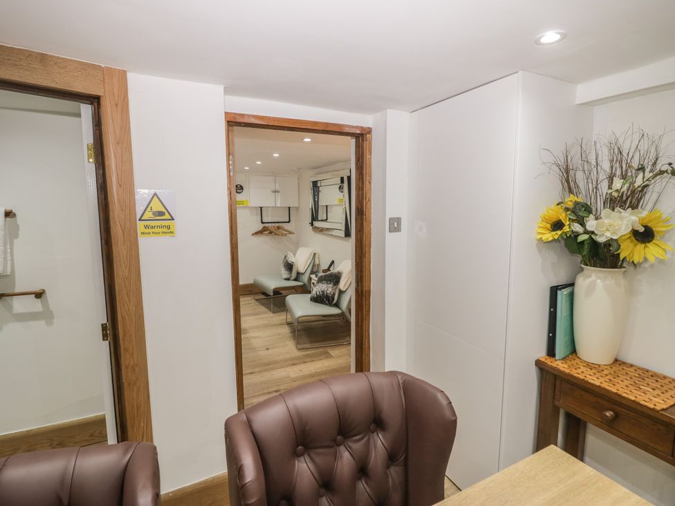 An office space with a chair and table at Park View Studio in Ambleside