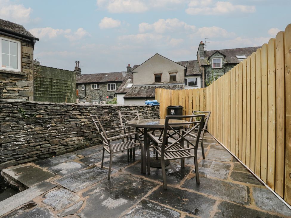 An outdoor dining area with a table and chairs at Park View in Ambleside