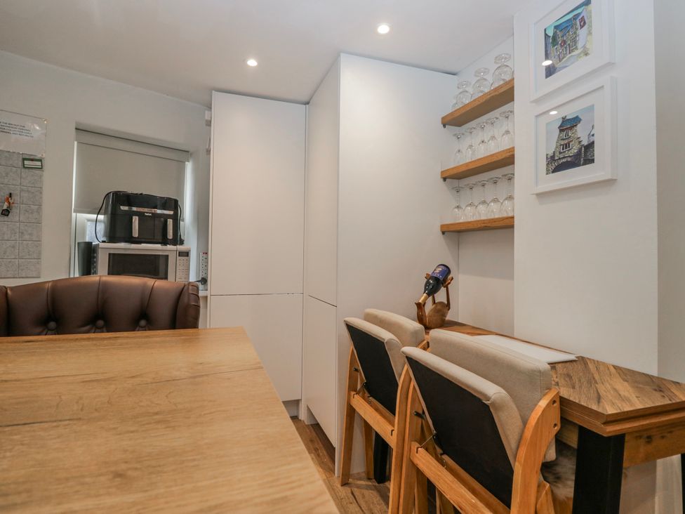A dining room with a table and chairs at Park View in Ambleside