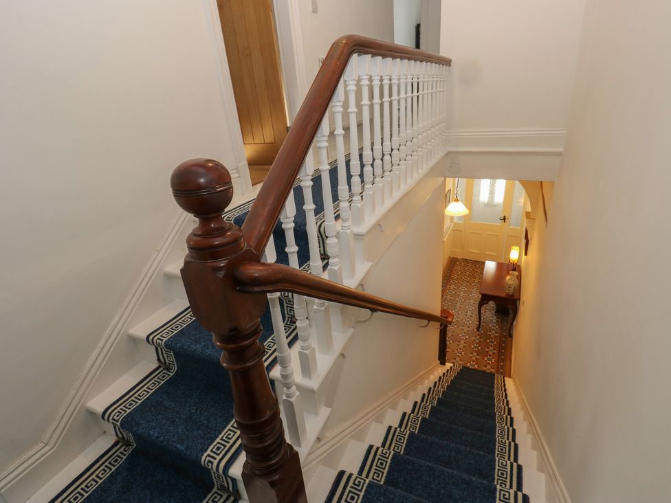 A staircase leading to a hallway at 27 Calton terrace Skipton