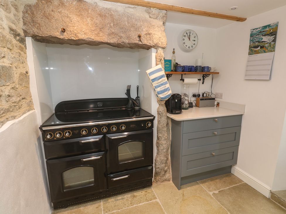 A kitchen with an oven and countertop at 12 Boswedden Terrace St Just
