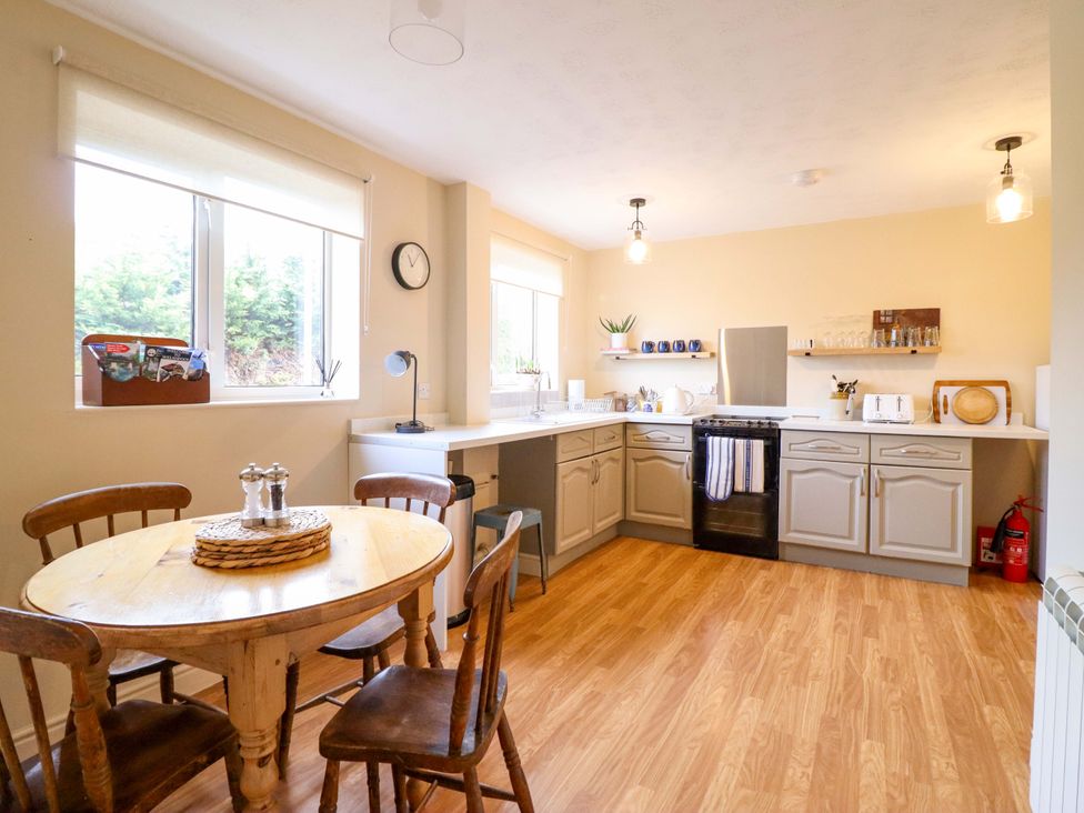 A kitchen with a round table and chairs at 2 Horseshoe Road in Montgomery